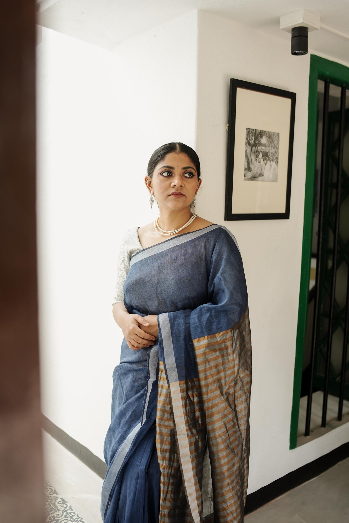 Celebrating Bengal handlooms - Sitara- Navy Blue linen cotton saree