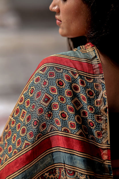 A trsyt with Ajrakh -Jharokha -Geometric Blue and Red Chanderi ajrakh saree