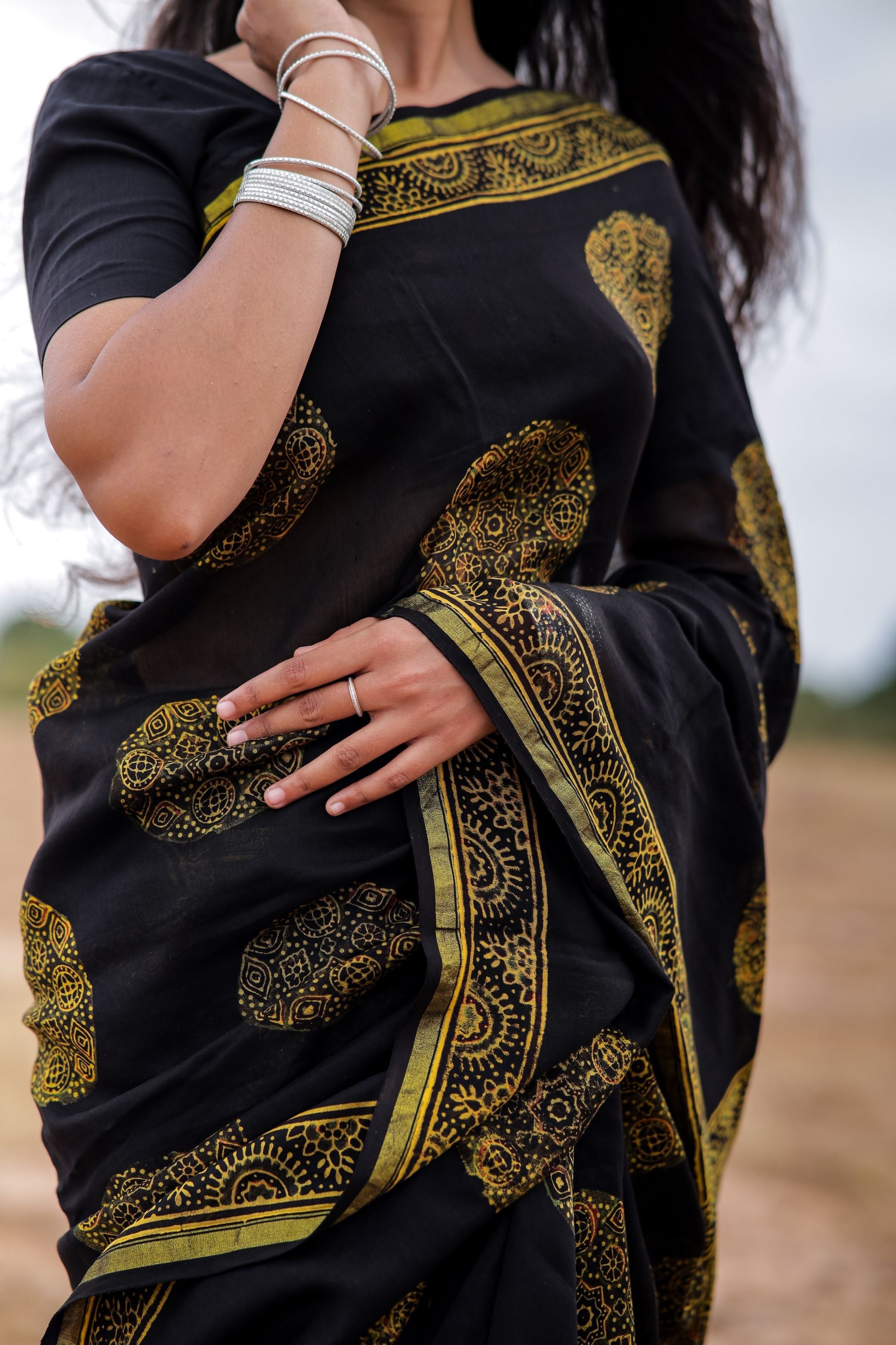 Jharokha -Black and green floral silk cotton Ajrakh handblockprinted saree Kaisori