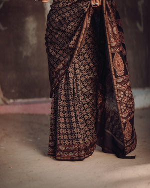 Jharokha -Black silk cotton Ajrakh handblockprinted saree Kaisori