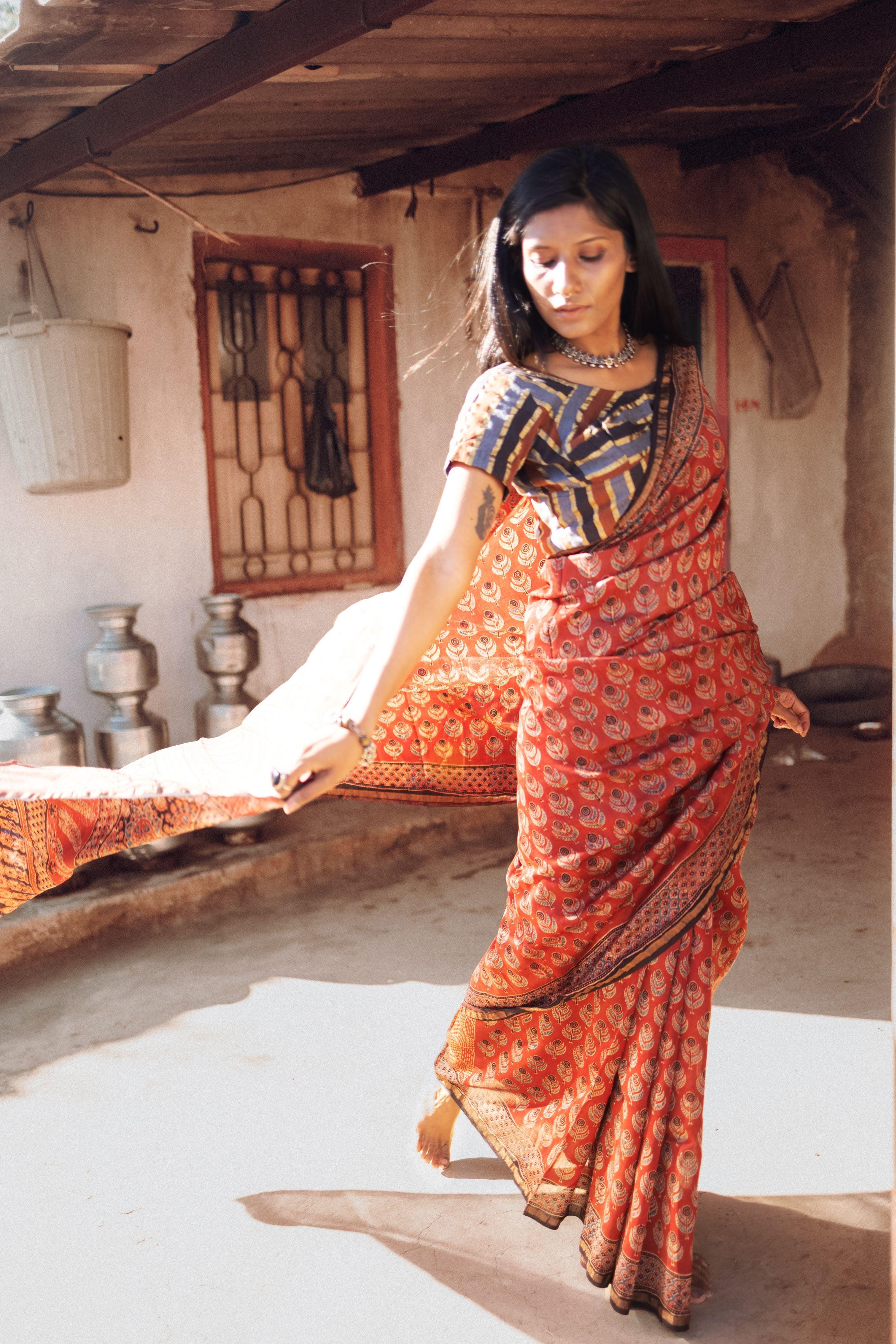 Jharokha -Red silk cotton Ajrakh handblockprinted saree Kaisori