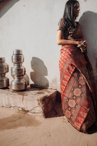 Jharokha -Red silk cotton Ajrakh handblockprinted saree Kaisori