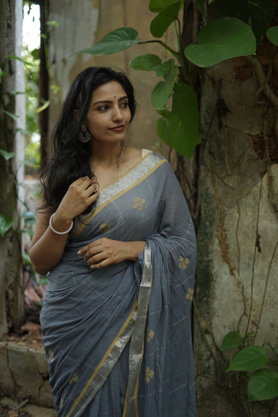 Photo of light grey saree in lace with black blouse