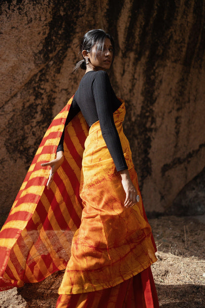 Zahra Batik dye Orange Silk cotton Saree Kaisori